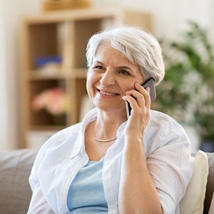 Older woman conversing on cell phone