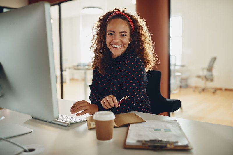 Woman smiling at an office